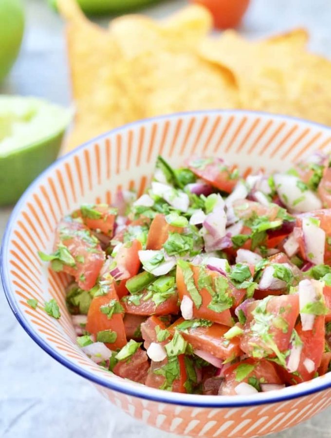 Fresh tomato salsa in a small bowl.
